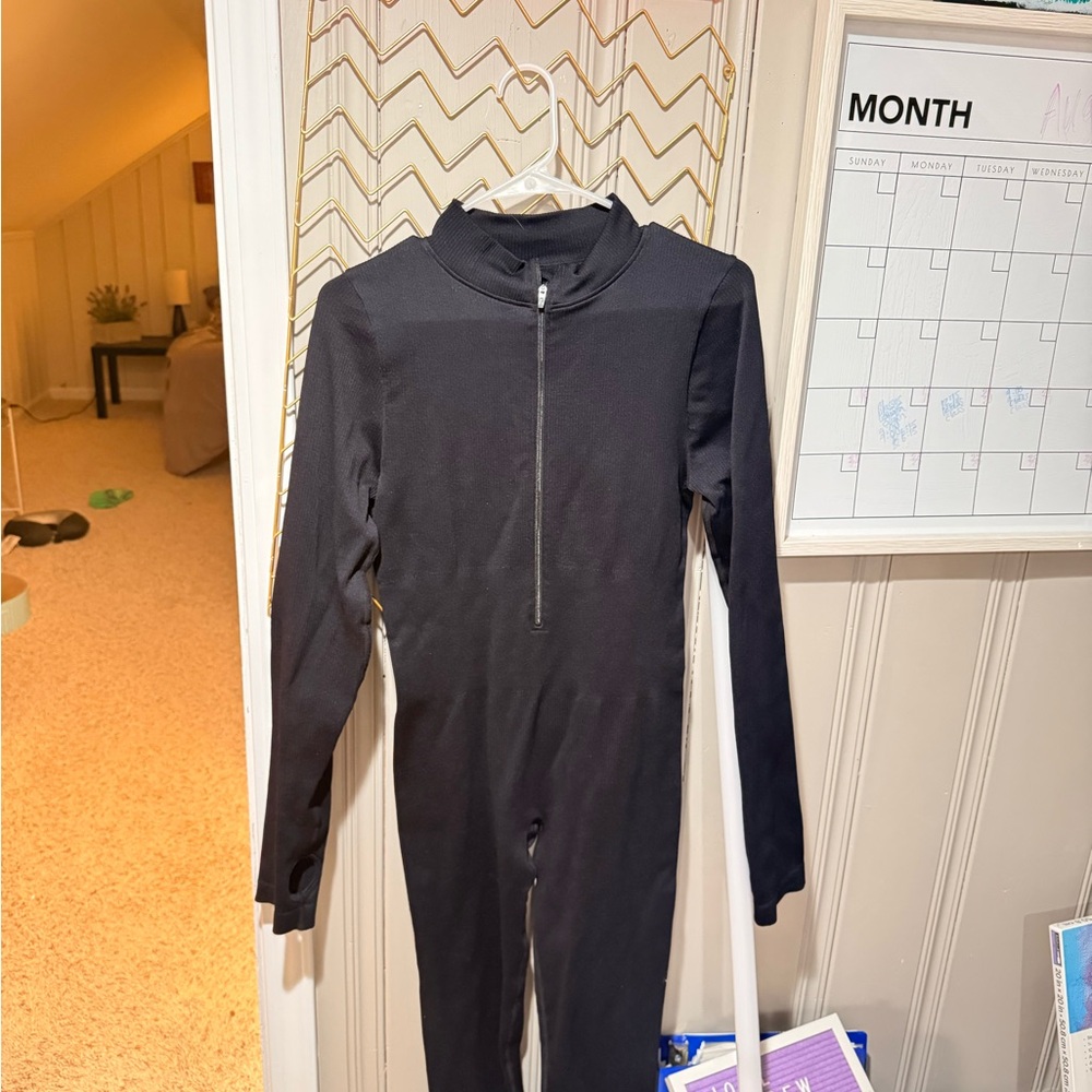Black one piece zip bodysuit
